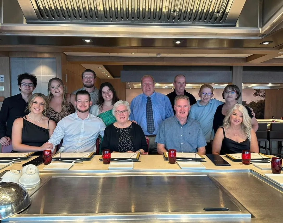 Three generations of a family gathered for a meal on their Royal Caribbean cruise